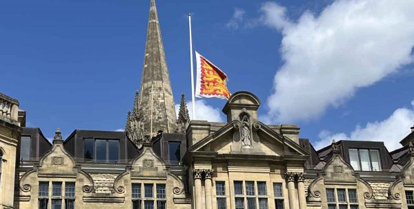 oriel flag flies as half mast outside church