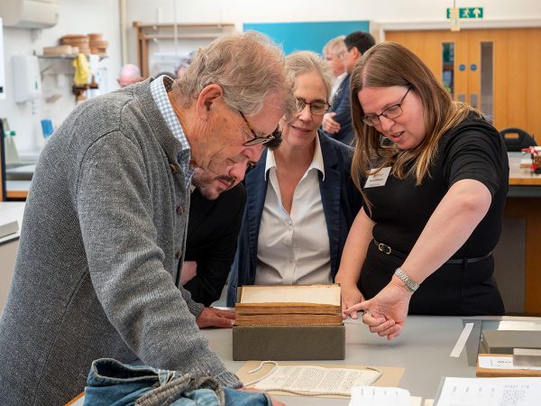 Oriel College's Librarian, Hannah Robertson, and Celia Bockmuehl, Head of Conservation at Oxford Conservation Consortium