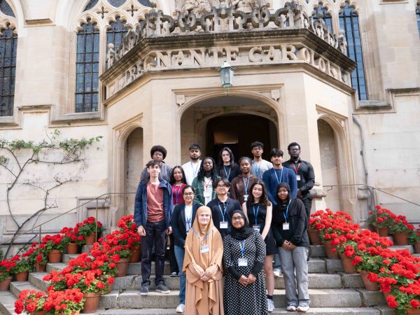 Generating Genius students standing in front of the steps in First Quad, Oriel College